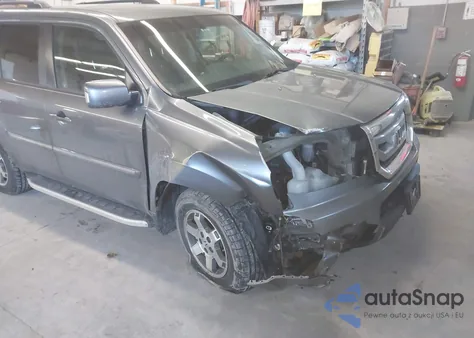 2009 Honda Pilot Touring z USA, uszkodzony, nr VIN 5FNYF48999B036392